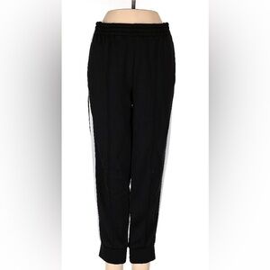 Golden by TNA black sweatpants from Aritzia